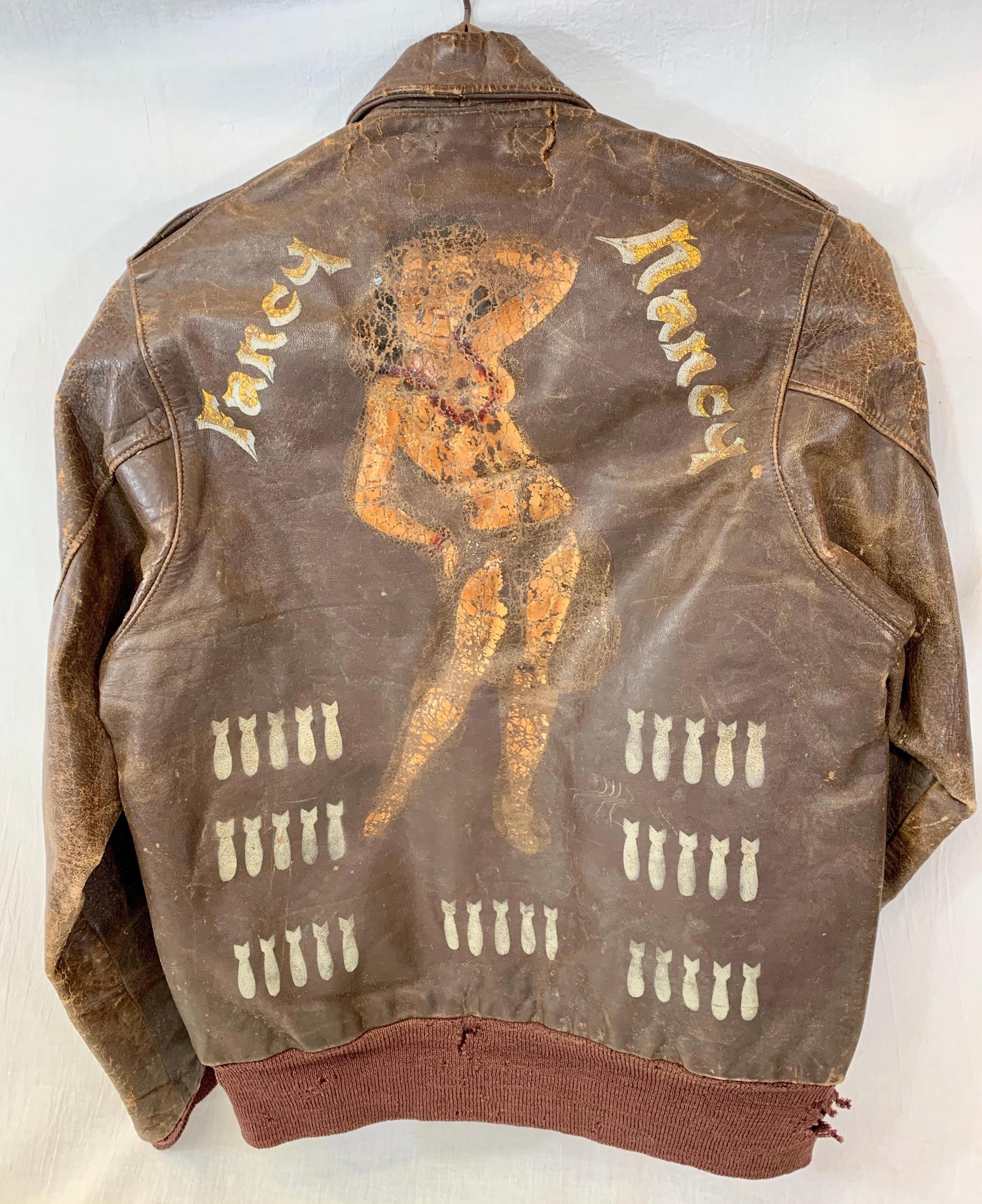 ﻿Historic Identified WWII Painted Leather A2 Bomber Jacket Display