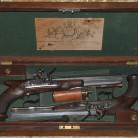 ﻿Fine Cased Pair of Flintlock Saw-handled Dueling Pistols by Thomas Mortimer, London, ca. 1810