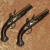 ﻿Silver-mounted Pair of English Flintlock Pistols by Wilson, ca. 1780